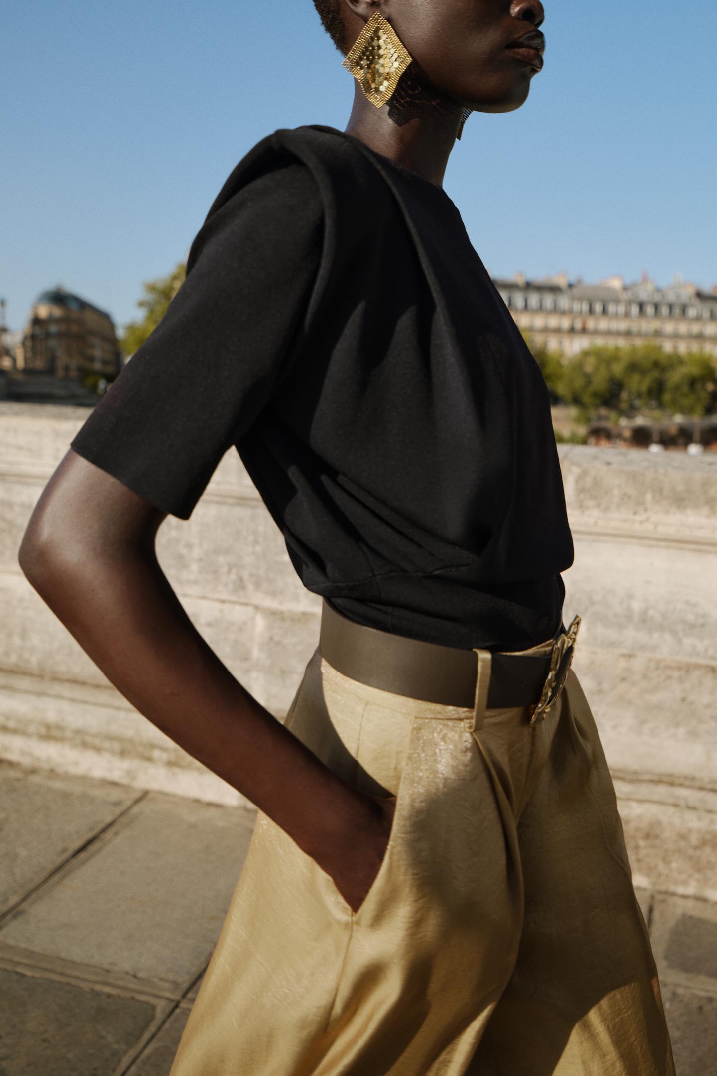 KNIT TOP WITH SHOULDER PADS